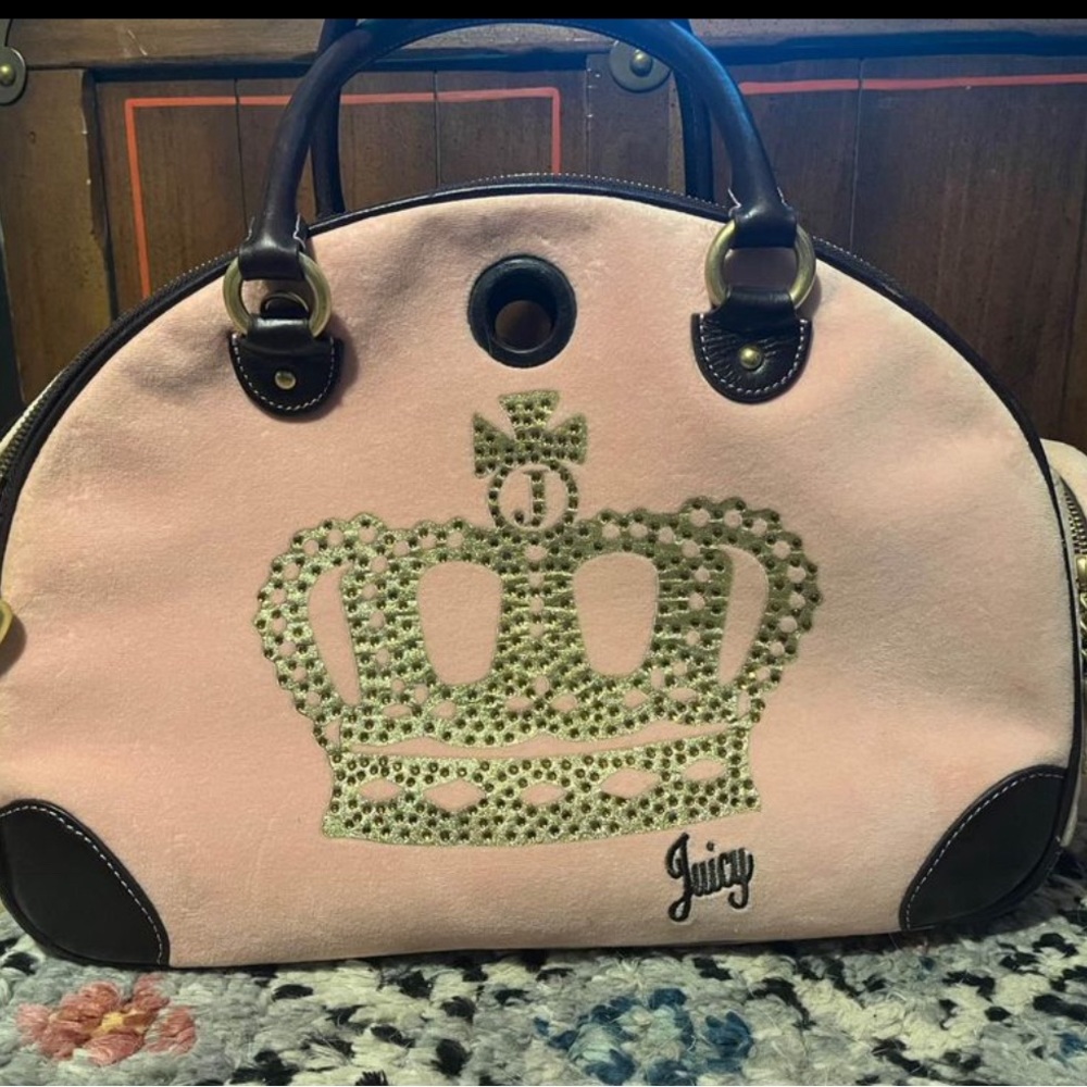 Juicy Couture Pet Carrier is the ultimate choice.